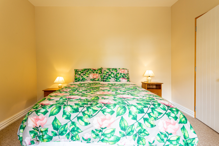 Photo of property: Queen bed