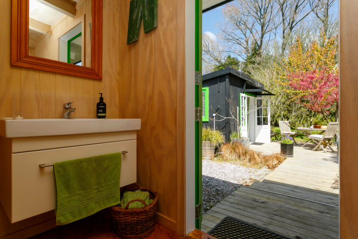 Photo of property: Toilet/vanity, access from the Lodge and Walnut