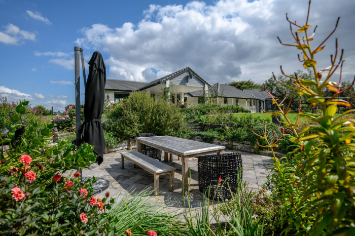 Photo of property: One of two outdoor entertaining areas.